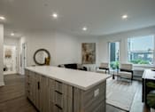 Thumbnail 11 of 33 - Modern kitchen island in a luxury apartment at The Rail at Bound Brook, NJ.