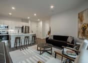 Thumbnail 8 of 33 - View of the kitchen and living room in a modern apartment near downtown Bound Brook, NJ.