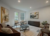 Thumbnail 10 of 33 - Sunlit living room in a Bound Brook NJ apartment with luxury finishes at The Rail at Bound Brook.