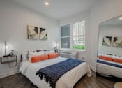 Thumbnail 18 of 33 - Spacious bedroom in a modern Bound Brook apartment featuring large windows at The Rail at Red Bank, NJ.