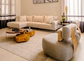 Thumbnail 7 of 18 - a living room filled with furniture and a large window