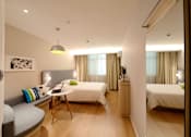 Thumbnail 5 of 18 - Master bedroom with queen beds and a desk