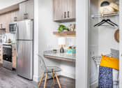 Thumbnail 1 of 18 - a kitchen or kitchenette at stay alfred on north capital