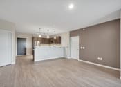 Thumbnail 48 of 98 - A spacious room with a white reception desk and a brown wall.