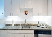 Thumbnail 7 of 18 - Granite Countertop Kitchen at The Palms on Main, Columbia, 29201