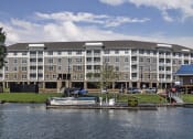 Thumbnail 2 of 20 - Property Exterior With Lake at Residence at Tailrace Marina, Mount Holly, NC