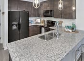 Thumbnail 20 of 20 - Stainless Steel Sink With Faucet In Kitchen at Residence at Tailrace Marina, North Carolina