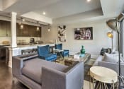 Thumbnail 9 of 20 - Luxurious Living Area With Kitchen View at Residence at Tailrace Marina, Mount Holly, NC