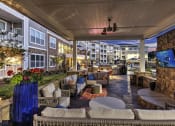 Thumbnail 6 of 20 - Outdoor Lounge Area With Smart TV at Residence at Tailrace Marina, North Carolina