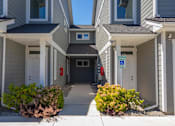 Thumbnail 51 of 53 - the entrance to an apartment building with a driveway at The Brix Apartments, Spokane Valley, WA, 99037