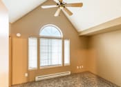 Thumbnail 39 of 73 - A room with a ceiling fan and a window at Graymayre Crossing Apartments, Spokane, WA, 99208