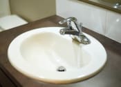 Thumbnail 22 of 43 - Bathroom Faucet at Railhead Apartments, Spokane, Washington