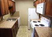 Thumbnail 30 of 43 - Fully Equipped Kitchen Includes Frost-Free Refrigerator, Electric Range, & Dishwasher at Railhead Apartments, Spokane, Washington