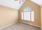 Thumbnail 67 of 73 - A room with a ceiling fan and a window with blinds at Graymayre Crossing Apartments, Spokane, WA, 99208