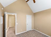 Thumbnail 68 of 73 - A room with a white door and a ceiling fan at Graymayre Crossing Apartments, WA, 99208