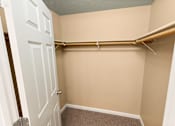 Thumbnail 72 of 73 - A white door is open to a closet with a brown carpet at Graymayre Crossing Apartments, Spokane, WA, 99208