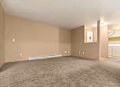 Thumbnail 23 of 73 - Empty room with carpeted floor and a window at Graymayre Crossing Apartments, Spokane, WA, 99208