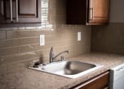 Thumbnail 6 of 43 - Renovated Bathrooms With Quartz Counters at Railhead Apartments, Spokane, WA, 99202