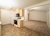 Thumbnail 5 of 23 - Kitchen with Dining at Morning Glory Circle Apartments, Washington, 99208