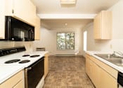 Thumbnail 6 of 23 - Kitchen gallery at Morning Glory Circle Apartments, Spokane, WA, 99208