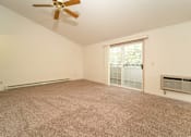 Thumbnail 9 of 23 - Living room full area with wooden flooring at Morning Glory Circle Apartments, Spokane, Washington