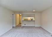 Thumbnail 9 of 19 - Carpeted Living Area at Charbonneau, Washington