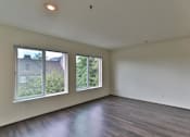 Thumbnail 3 of 19 - Living Room With Expansive Window at Charbonneau, Washington, 98101