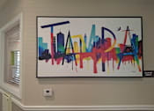 Thumbnail 6 of 22 - A colorful painting of a city skyline with the word "TAMPA" written across it. Madison Highlands 2 Art in Tampa Florida.