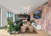 Thumbnail 21 of 63 - clubroom with a green couch and a television on the wall