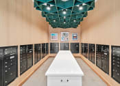 Thumbnail 37 of 63 - the locker room is equipped with new lockers and a table