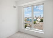 Thumbnail 46 of 63 - an ornate white plaster wall with a window