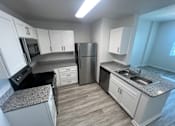 Thumbnail 8 of 22 - Kitchen and living space at Madison Highlands 2 Tampa Florida
