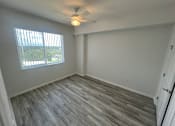 Thumbnail 10 of 22 - Large, bright bedroom with ceiling fan at Madison Highlands 2 Tampa Florida