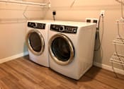 Thumbnail 20 of 23 - In Unit Washer Dryer, front load,  Senior Apartment, Senior living, Maplewood, White Bear Lake, Saint Paul, Frost English Silver