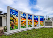 Thumbnail 1 of 6 - A row of four large paintings of horses in a field with the text "MADISON OAKS" on the right.