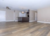 Thumbnail 2 of 31 - the living room and kitchen in a 555 waverly unit