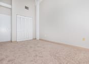 Thumbnail 43 of 58 - an empty living room with a door to a closet