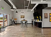 Thumbnail 10 of 19 - A modern interior with a dining area and a kitchenette. at Vivo Toledo Apartments, Toledo, OH
