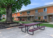 Thumbnail 19 of 23 - our apartments offer a picnic table in the back yard