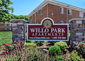 Thumbnail 15 of 23 - a picture of the willo park apartments sign