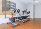 Thumbnail 9 of 43 - Fitness Center equipment bikes  at 444 Park Apartments, Richmond Heights, Ohio