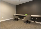 Thumbnail 22 of 28 - an empty office with two desks and two chairs