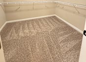Thumbnail 18 of 27 - A room with a carpet that has the word "MARVEL" written on it.