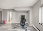 Thumbnail 44 of 48 - a room with a chair and a lot of tires in it