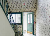 Thumbnail 25 of 31 - Entrance with floral wallpaper