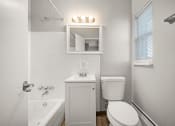 Thumbnail 20 of 48 - a bathroom with a toilet sink and tub and a mirror
