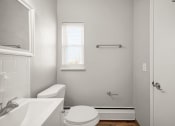Thumbnail 22 of 48 - a bathroom with a toilet sink and a window