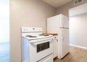Thumbnail 8 of 19 - Upgraded kitchen with white appliances