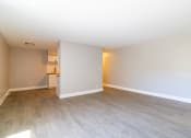 Thumbnail 12 of 14 - Living area with vinyl plank flooring