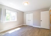 Thumbnail 8 of 14 - Bedroom with natural lighting